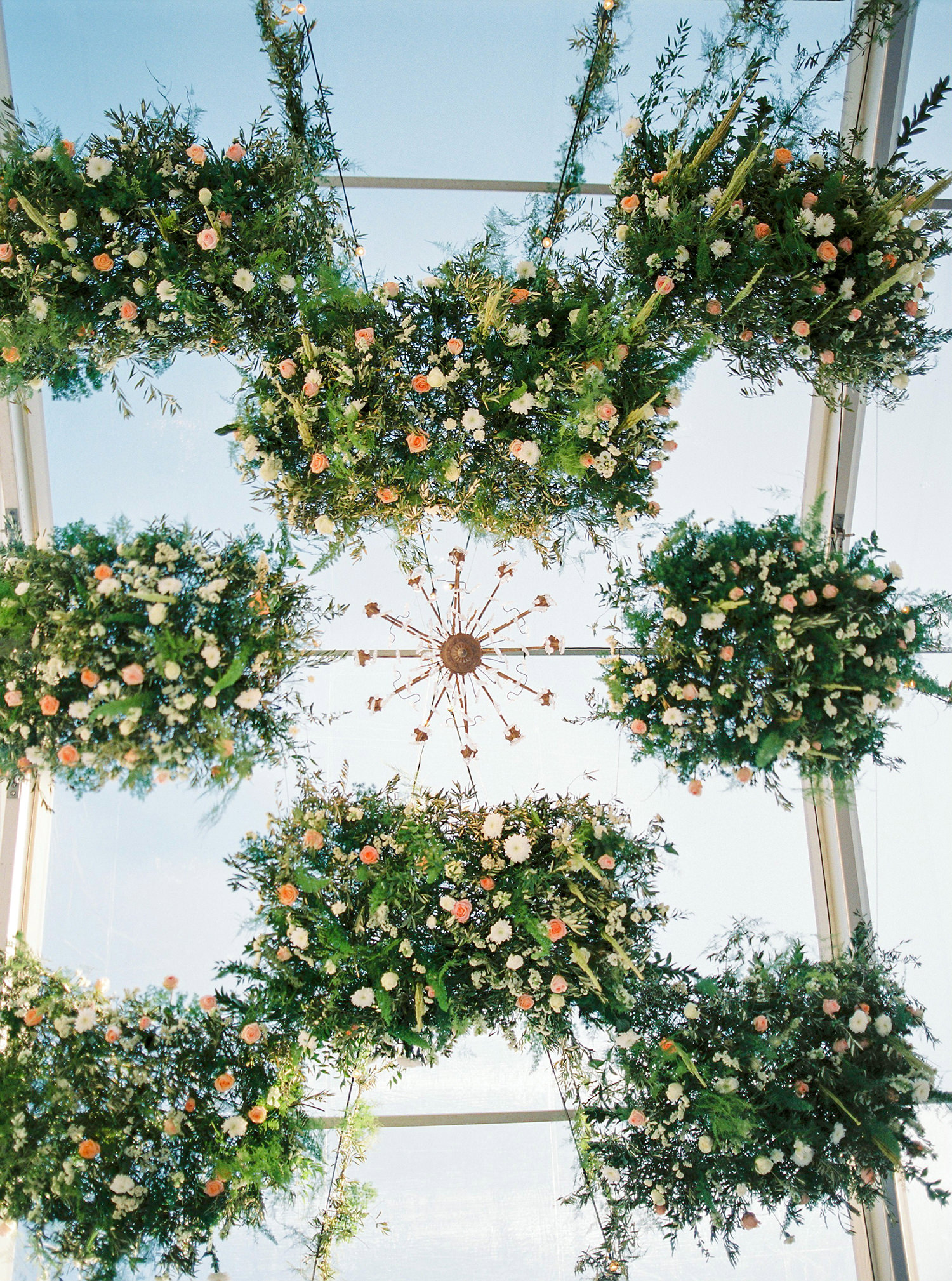 Wedding floral design ceiling installation