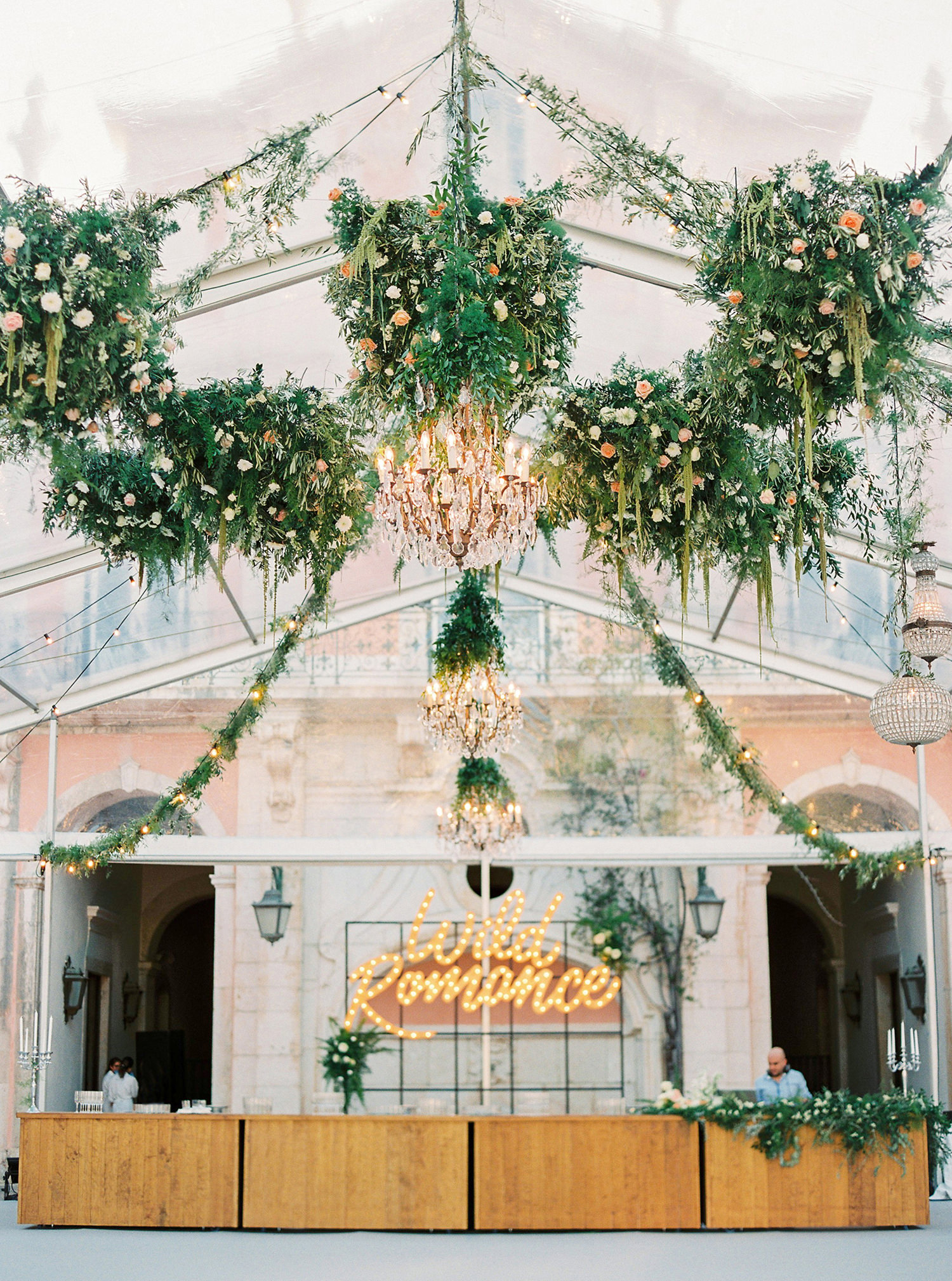 Wedding floral design ceiling installation