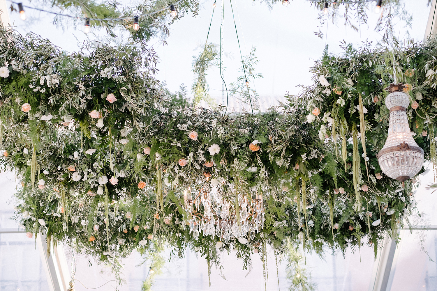 Wedding floral design ceiling installation