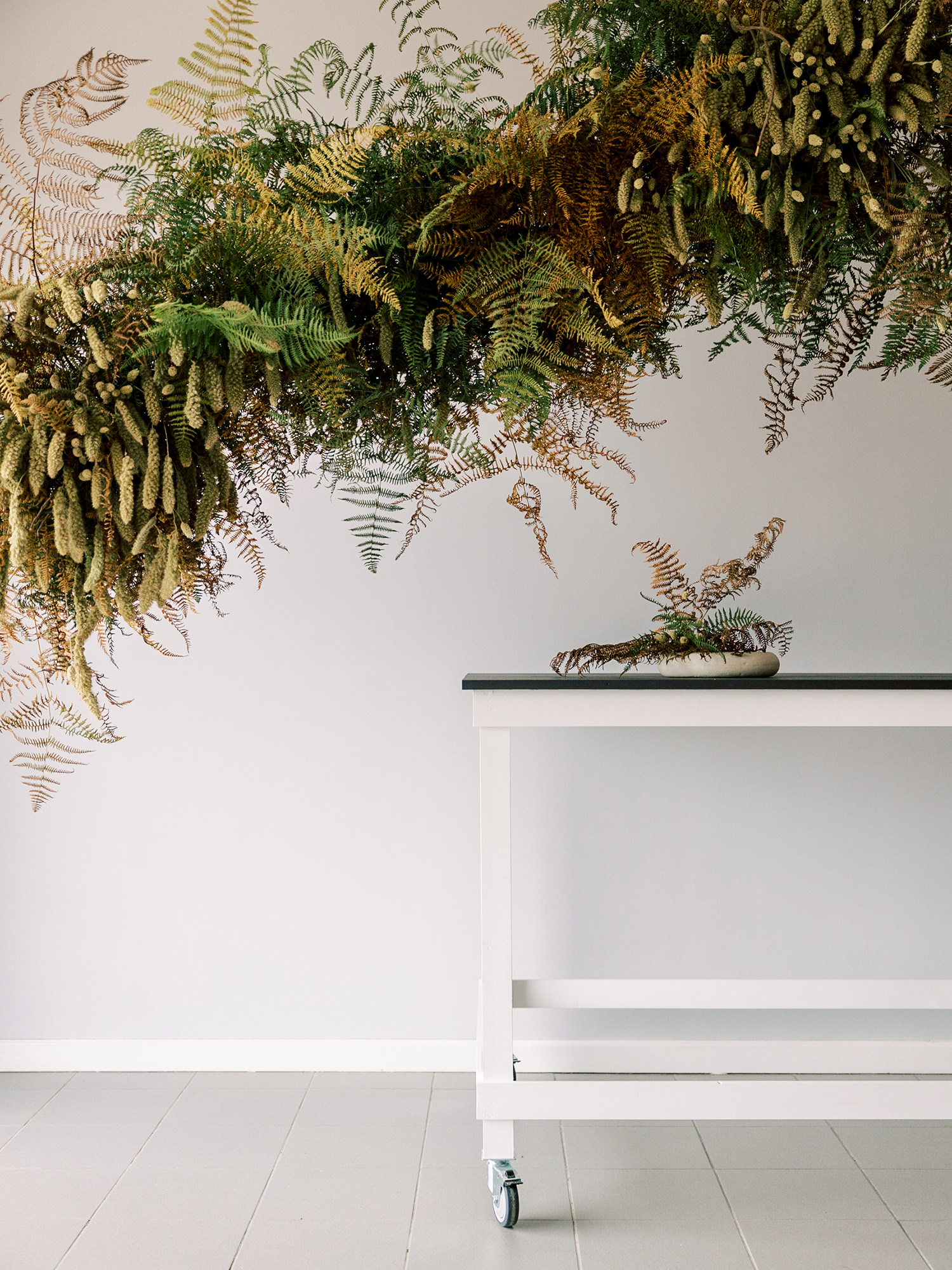 FLoral design using ferns and dried flowers and with no floral foam